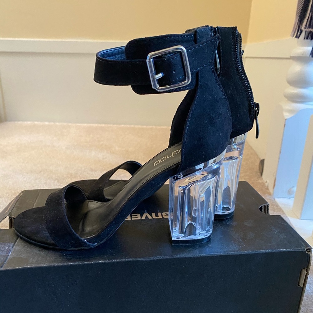 Black strap sandals with clear perspex heels